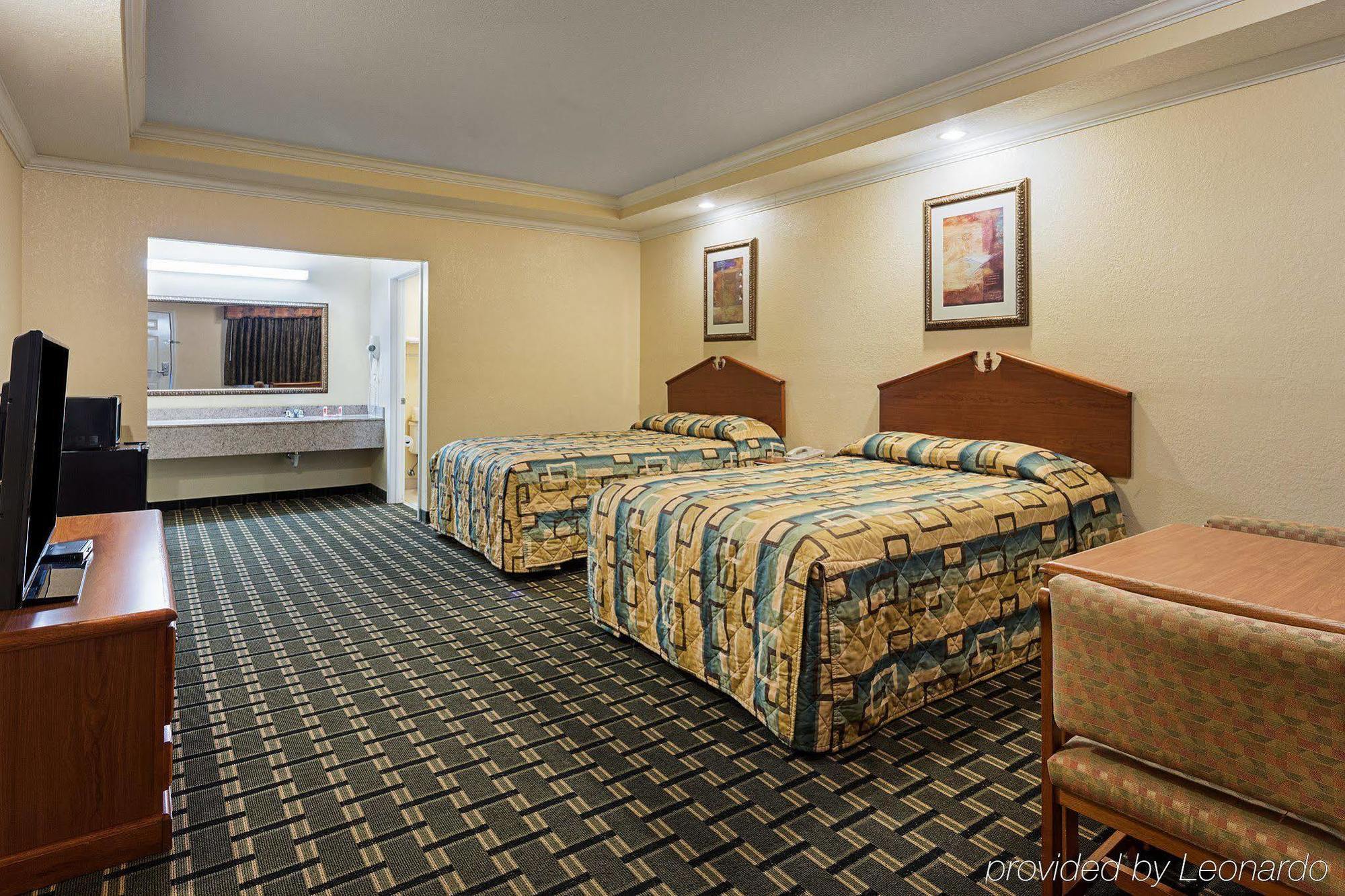Econo Lodge Inn & Suites Горн-Лейк Екстер'єр фото
