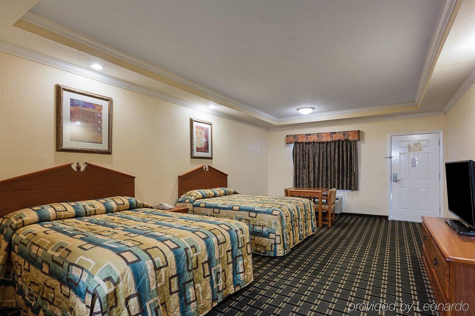 Econo Lodge Inn & Suites Горн-Лейк Екстер'єр фото
